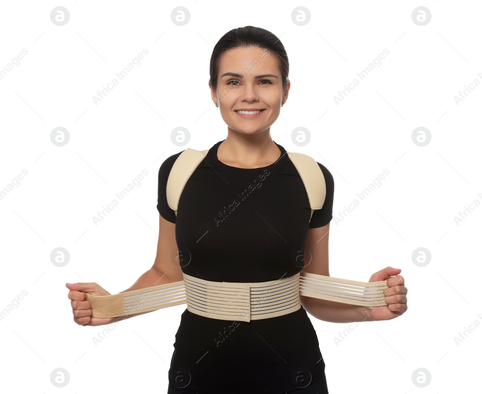 Photo of Beautiful woman with orthopedic corset on white background