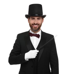 Happy magician in top hat holding wand on white background