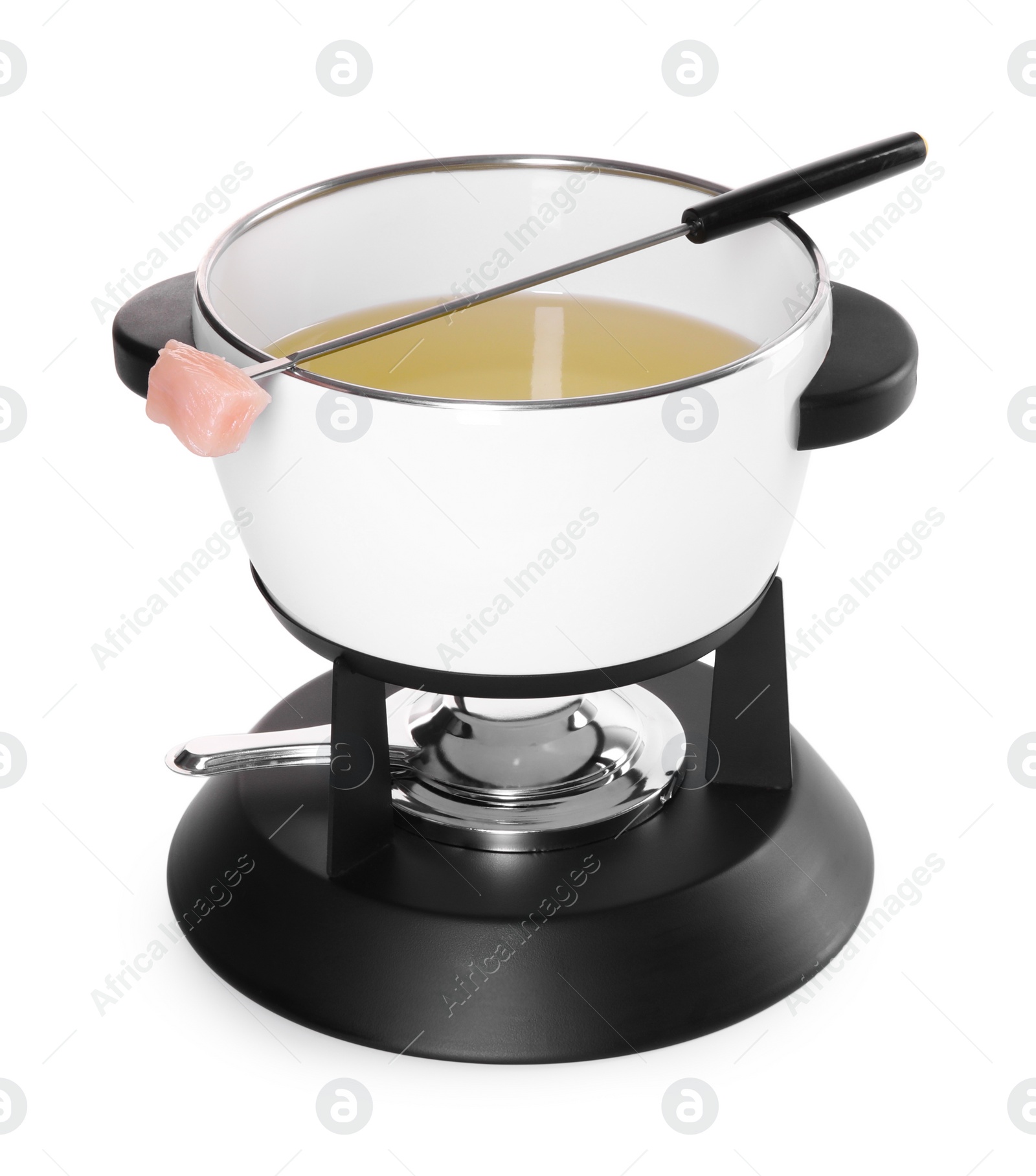 Photo of Oil in fondue pot and fork with piece of raw meat isolated on white