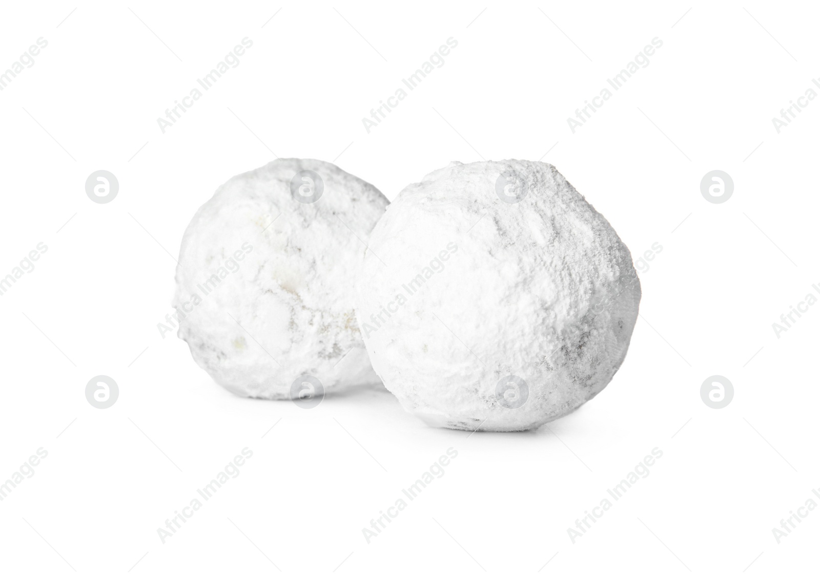 Photo of Tasty Christmas snowball cookies on white background