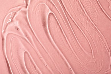 Photo of Cosmetic gel on pink background, top view