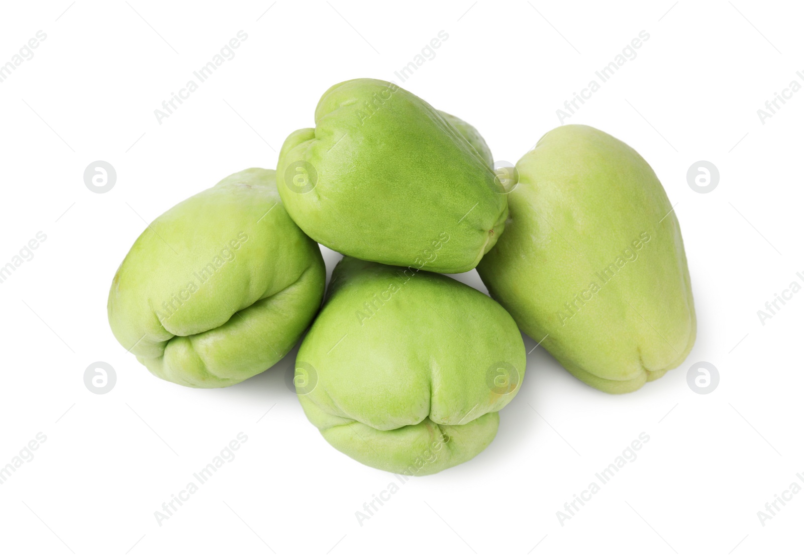 Photo of Many fresh green chayote isolated on white, top view