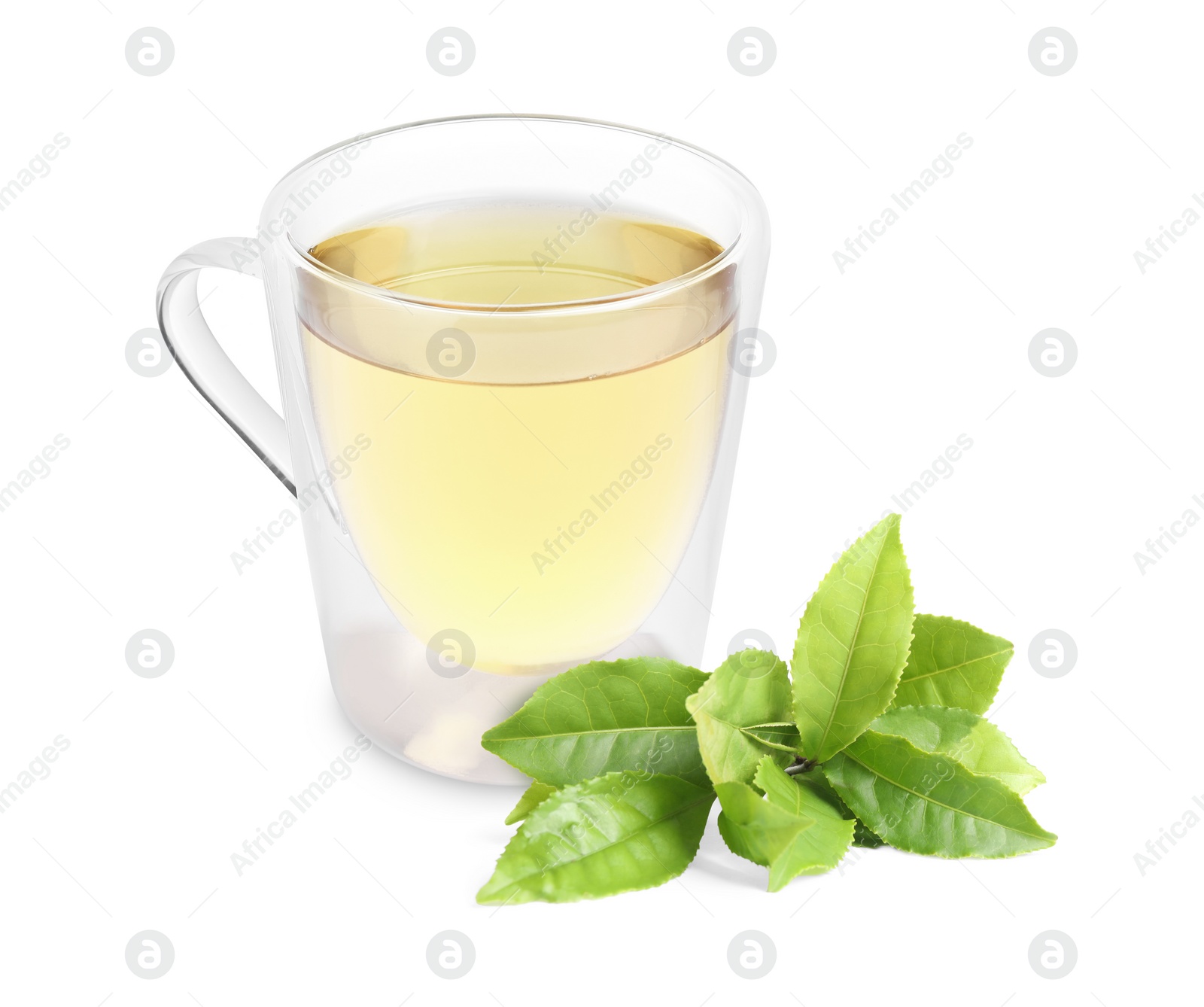 Image of Green tea in glass cup and green leaves isolated on white