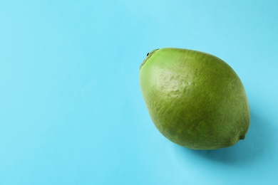 Photo of Fresh green coconut on color background