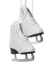Photo of Pair of figure ice skates hanging on white background