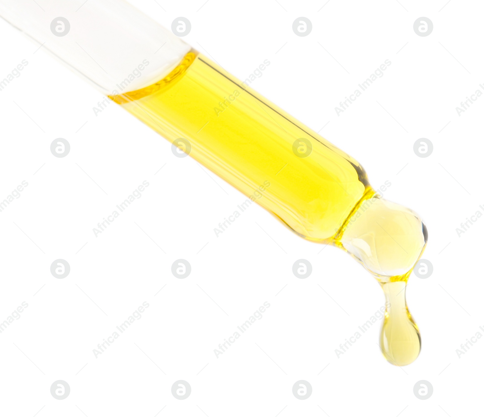 Photo of Dripping tincture from pipette isolated on white