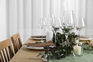 Stylish elegant table setting for festive dinner indoors