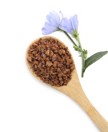 Photo of Spoon of chicory granules and flowers on white background, top view