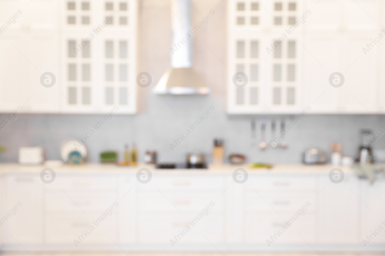 Photo of Blurred view of modern kitchen. Interior design