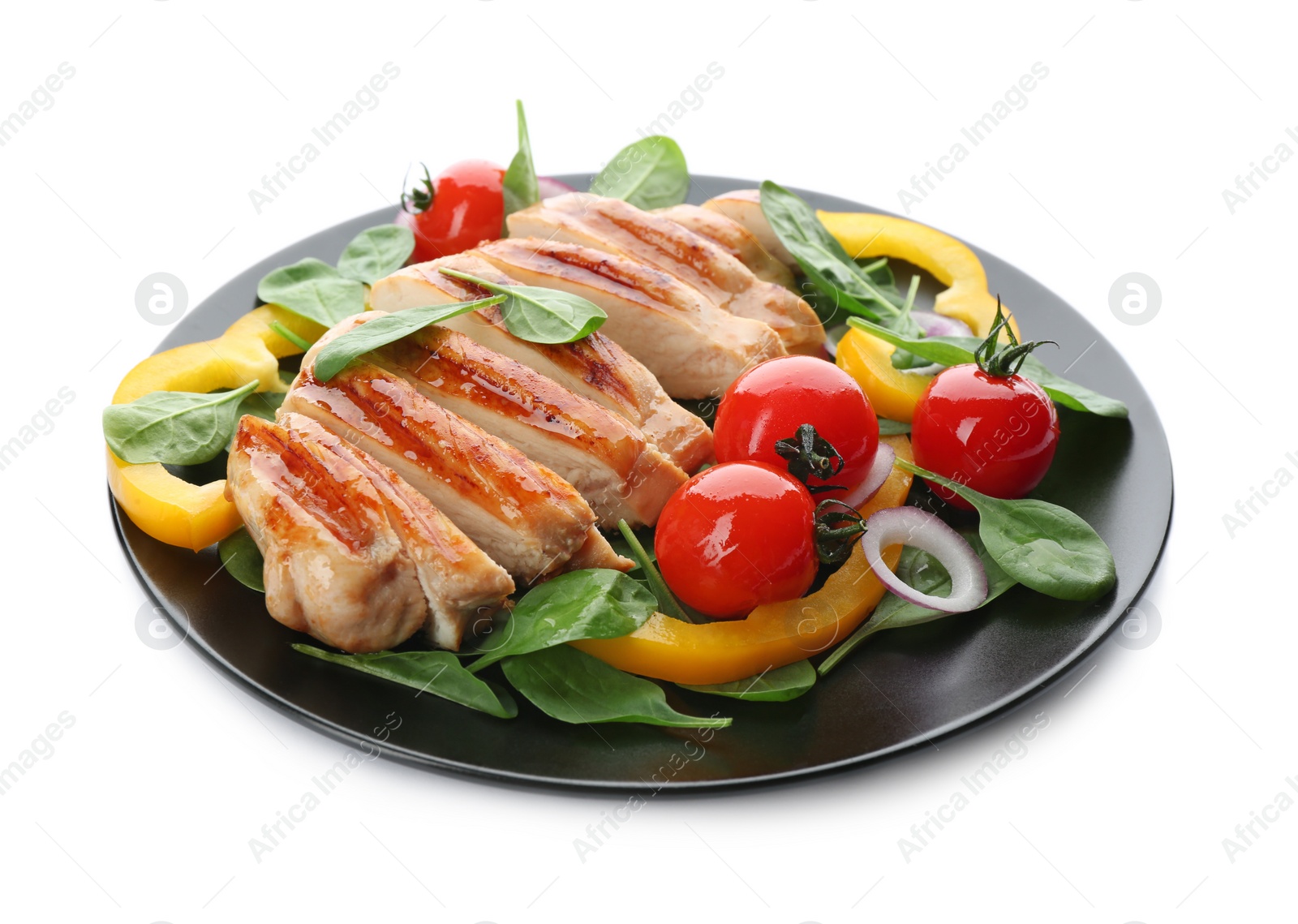 Photo of Delicious grilled chicken with fresh vegetables and spinach isolated on white