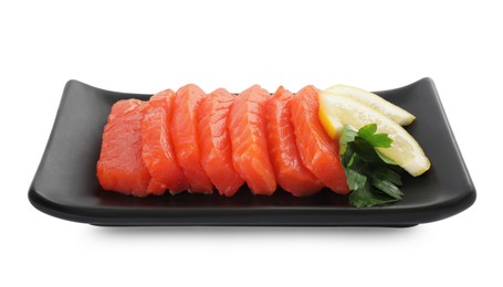 Photo of Delicious salmon sashimi served with lemon and parsley isolated on white