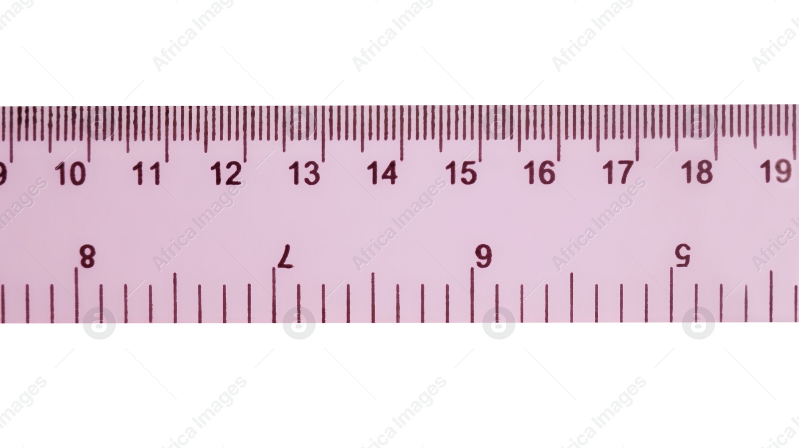 Photo of Ruler with measuring length markings in centimeters isolated on white, top view