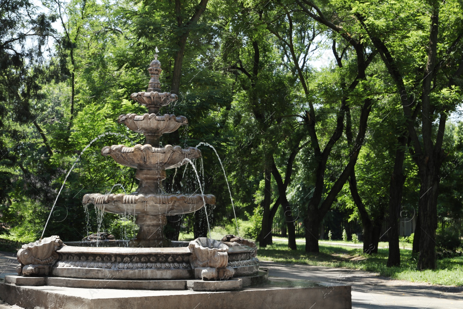 Photo of Beautiful view of fountain in park on sunny day