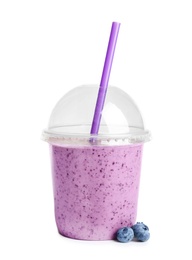 Photo of Tasty blueberry smoothie in plastic cup on white background