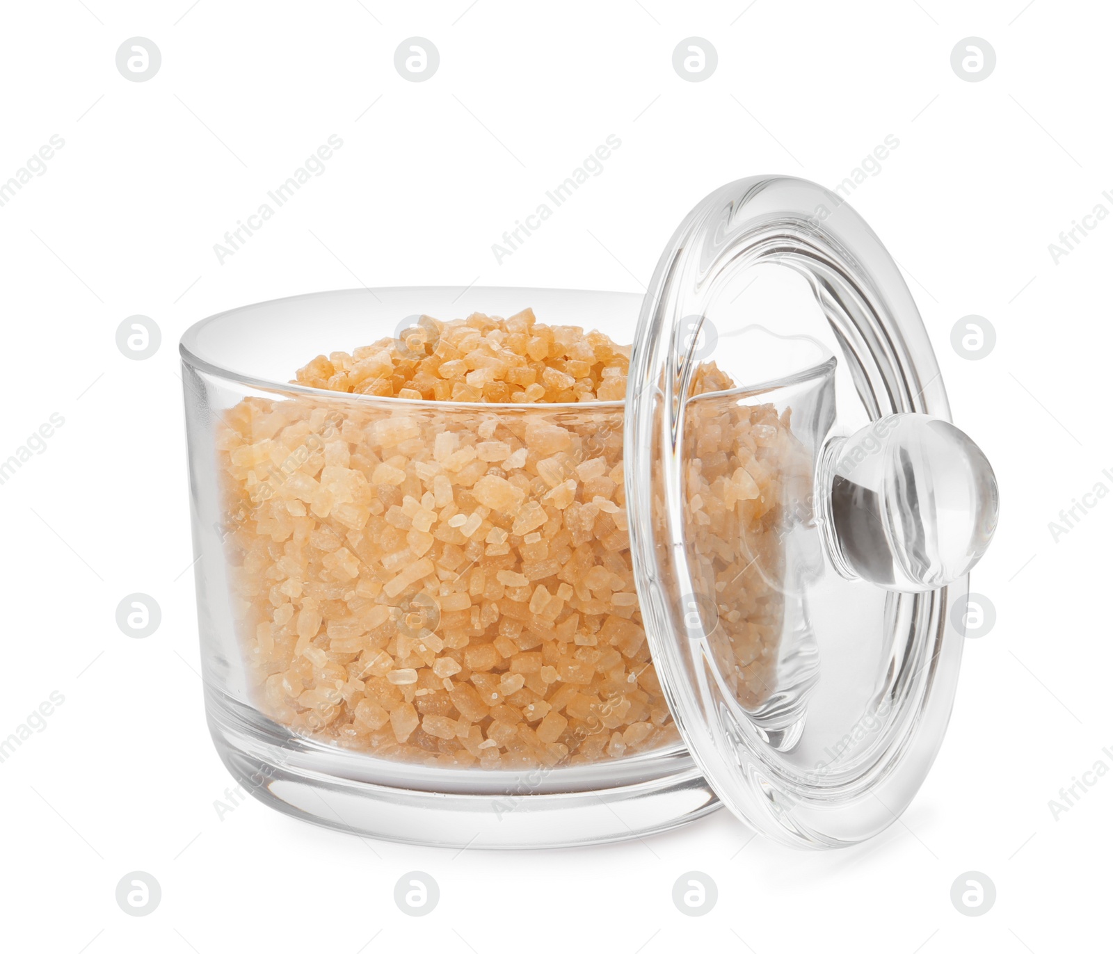 Photo of Glass bowl with brown sugar isolated on white