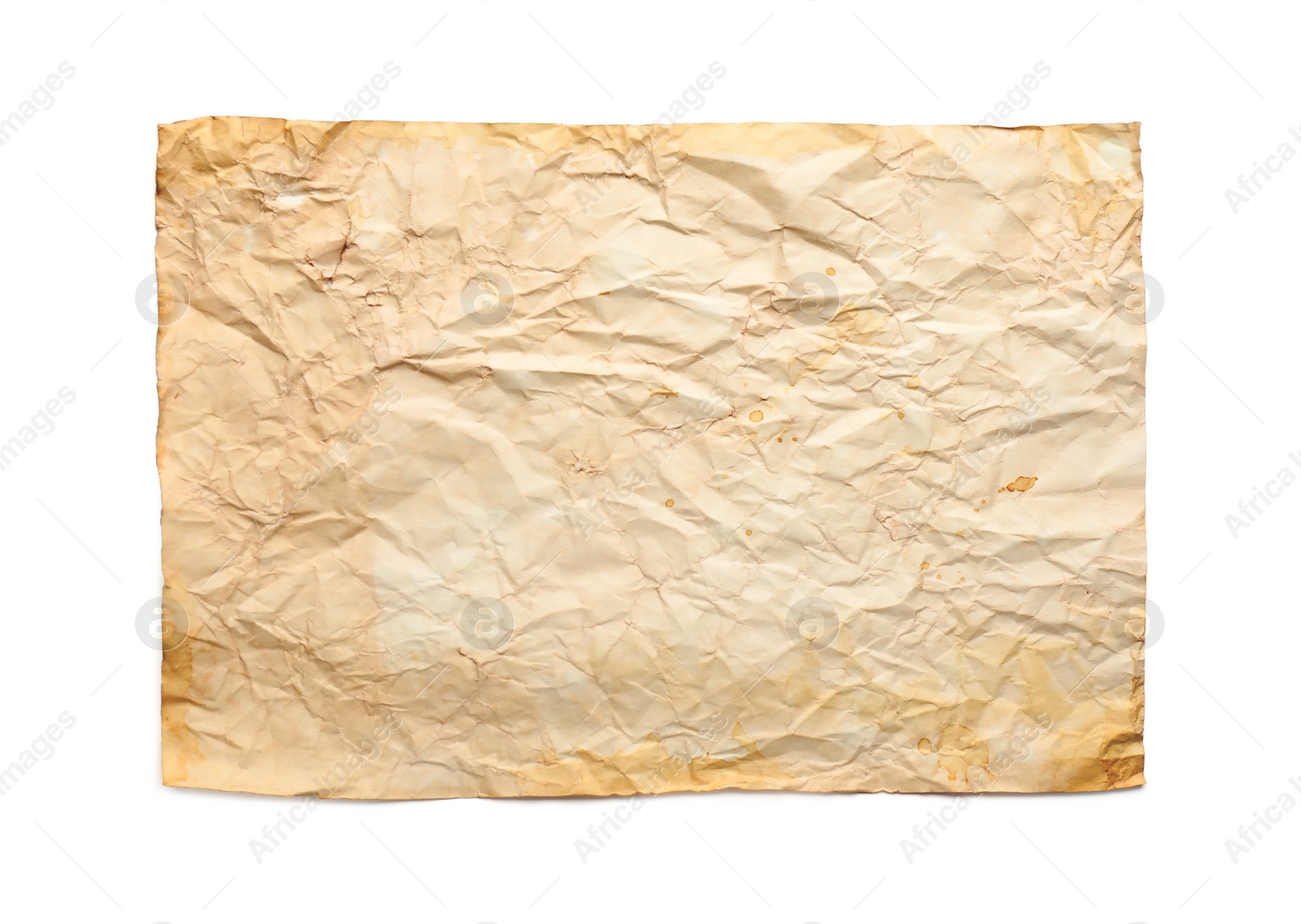 Photo of Sheet of old parchment paper isolated on white, top view. Space for design