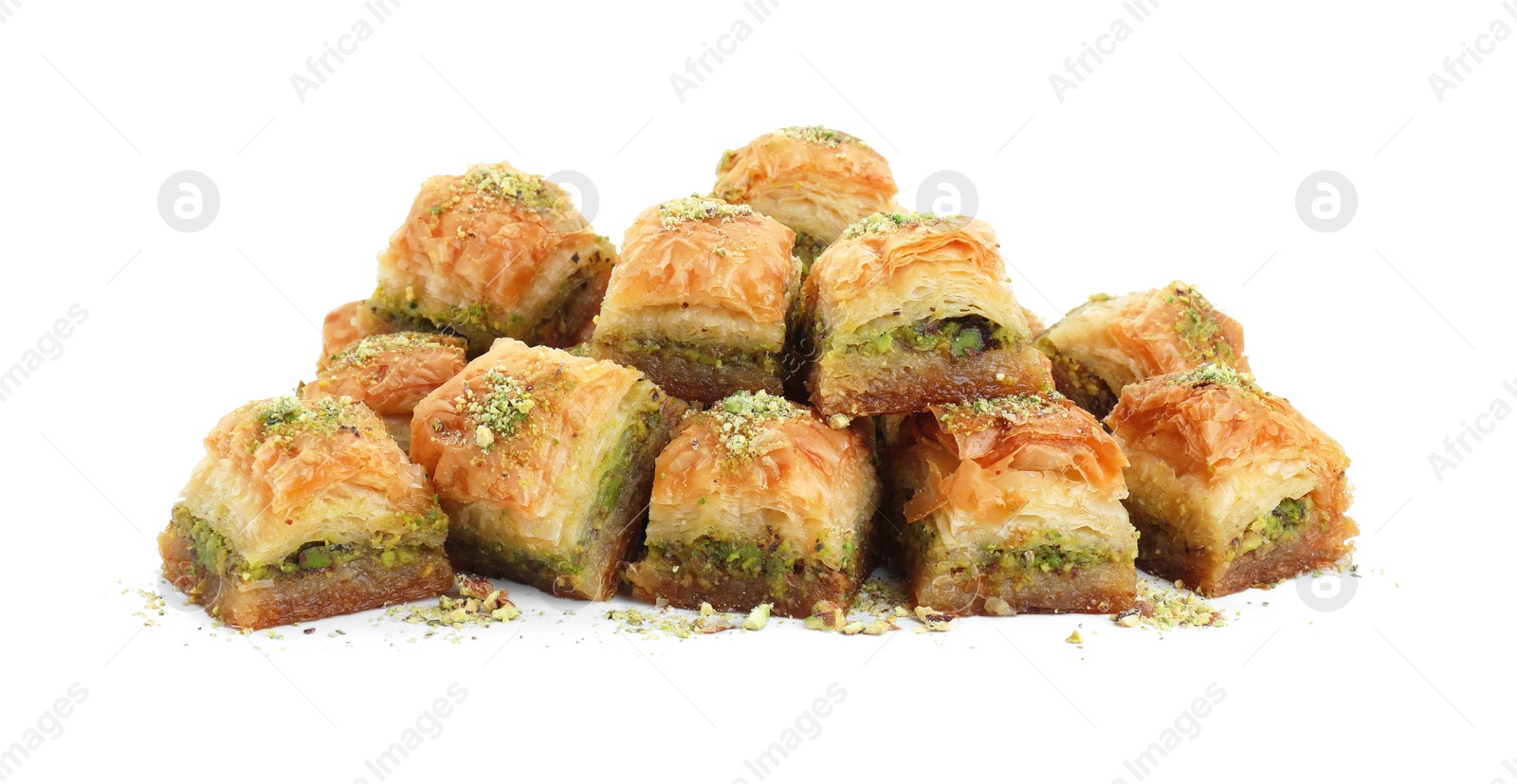 Photo of Delicious fresh baklava with chopped nuts isolated on white. Eastern sweets