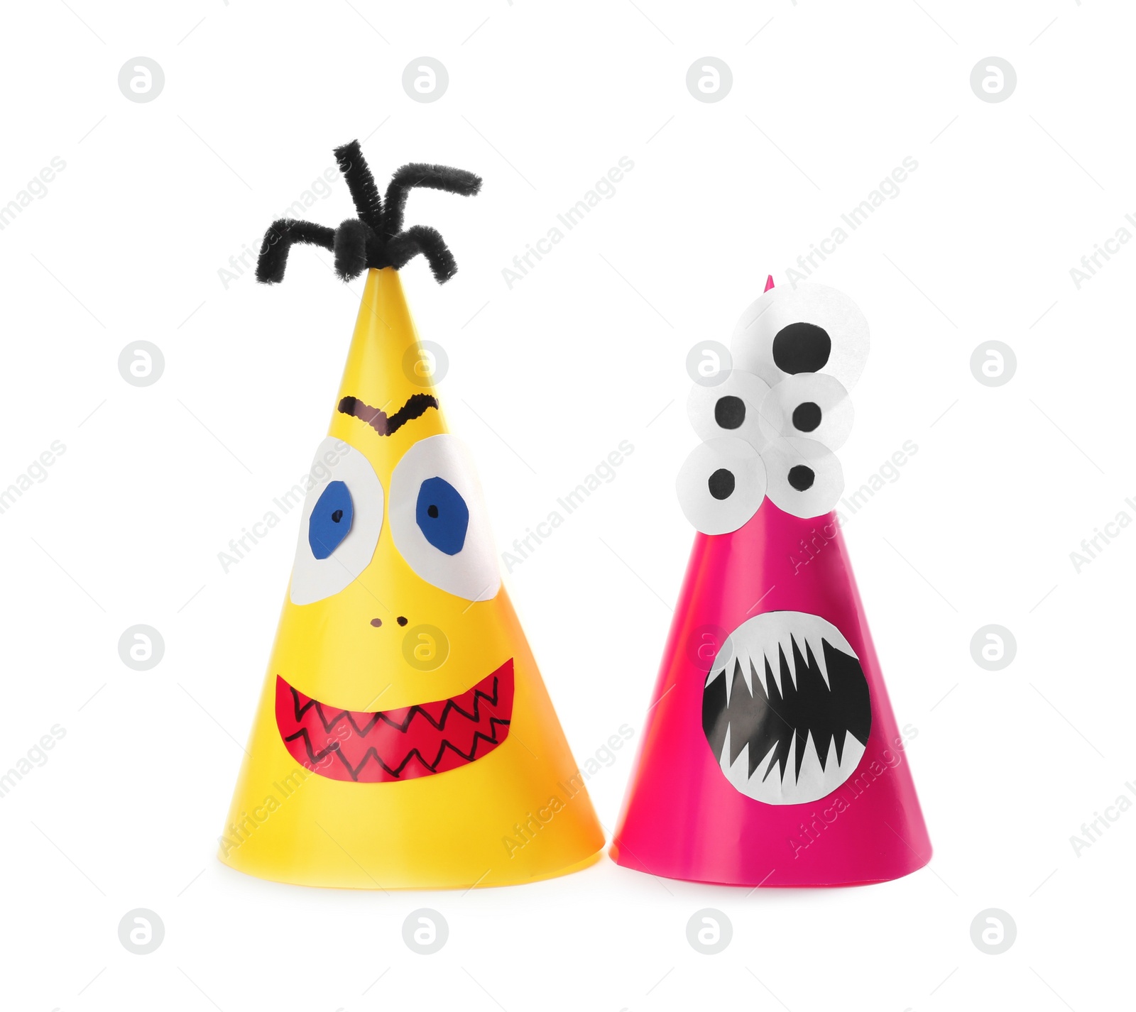 Photo of Funny monsters on white background. Halloween decoration