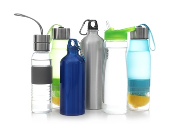 Photo of Different water bottles for sports on white background