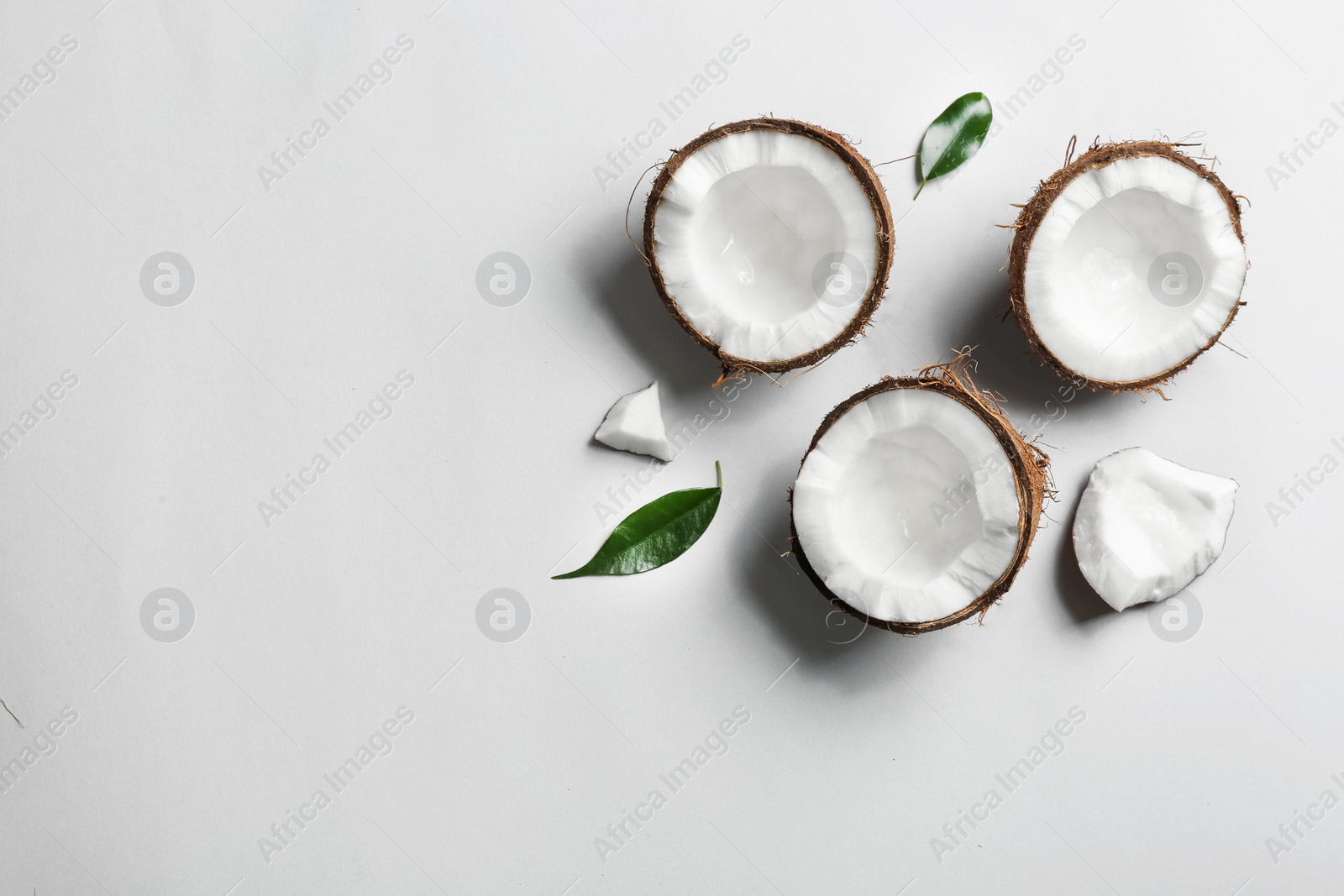 Photo of Composition with coconuts on white background, top view