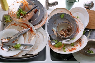 Photo of Dirty dishes in sink after new year party
