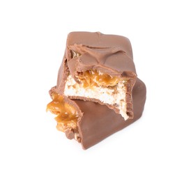 Photo of Pieces of tasty chocolate bar with nougat on white background