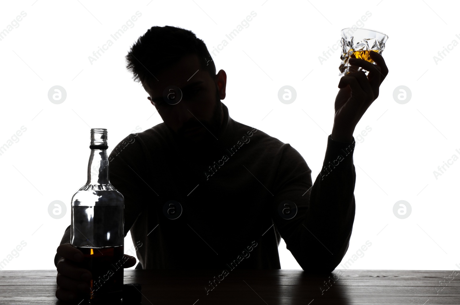 Photo of Silhouette of addicted man with alcoholic drink on white background