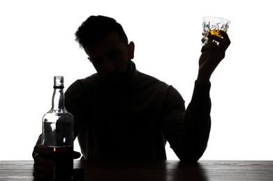 Silhouette of addicted man with alcoholic drink on white background