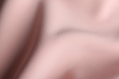 Photo of Texture of beautiful pink fabric as background, closeup