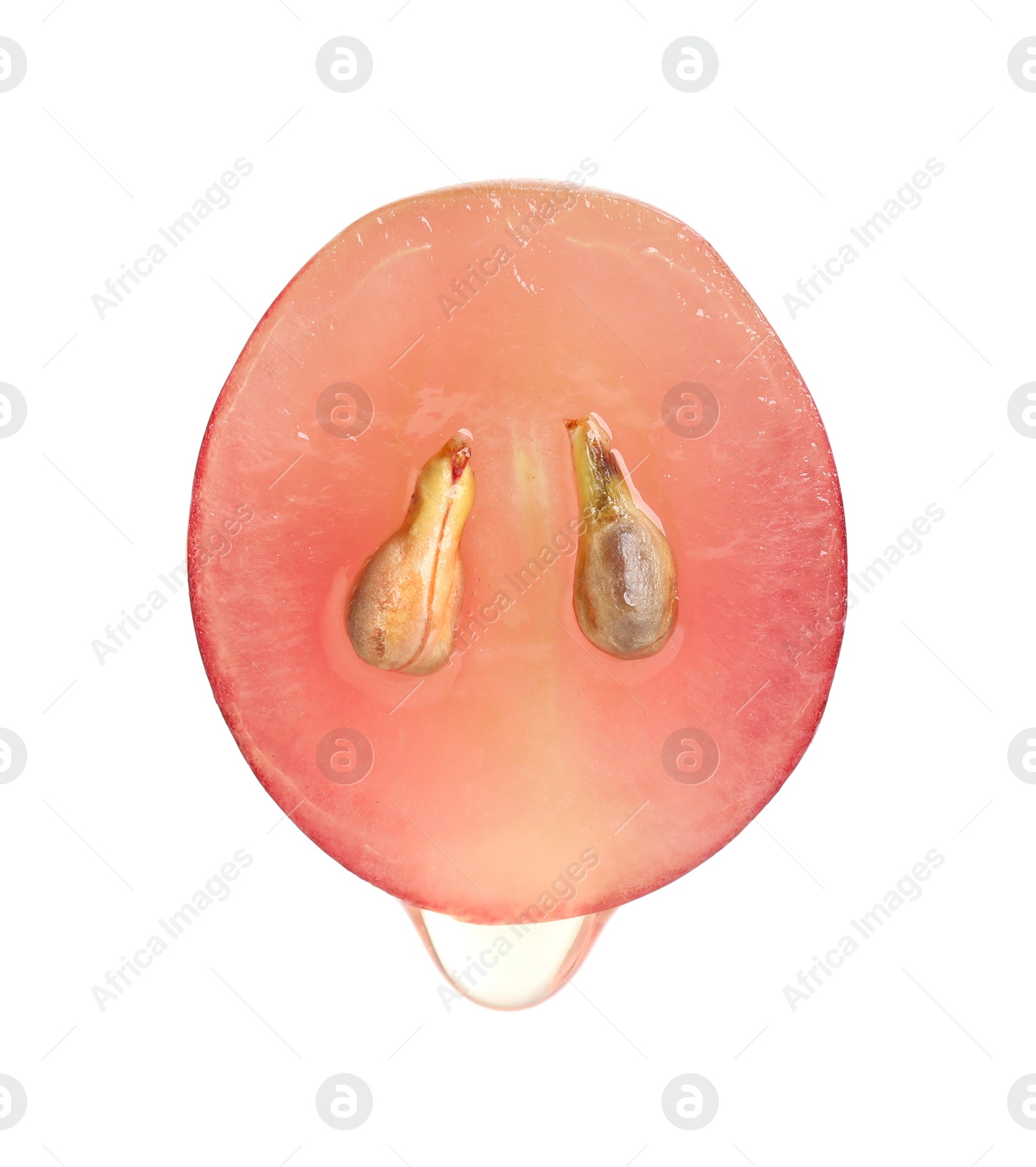 Photo of Natural grape seed oil dripping from berry on white background. Organic cosmetic