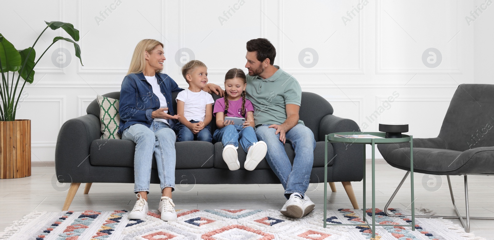 Image of Happy family with children at home. Banner design