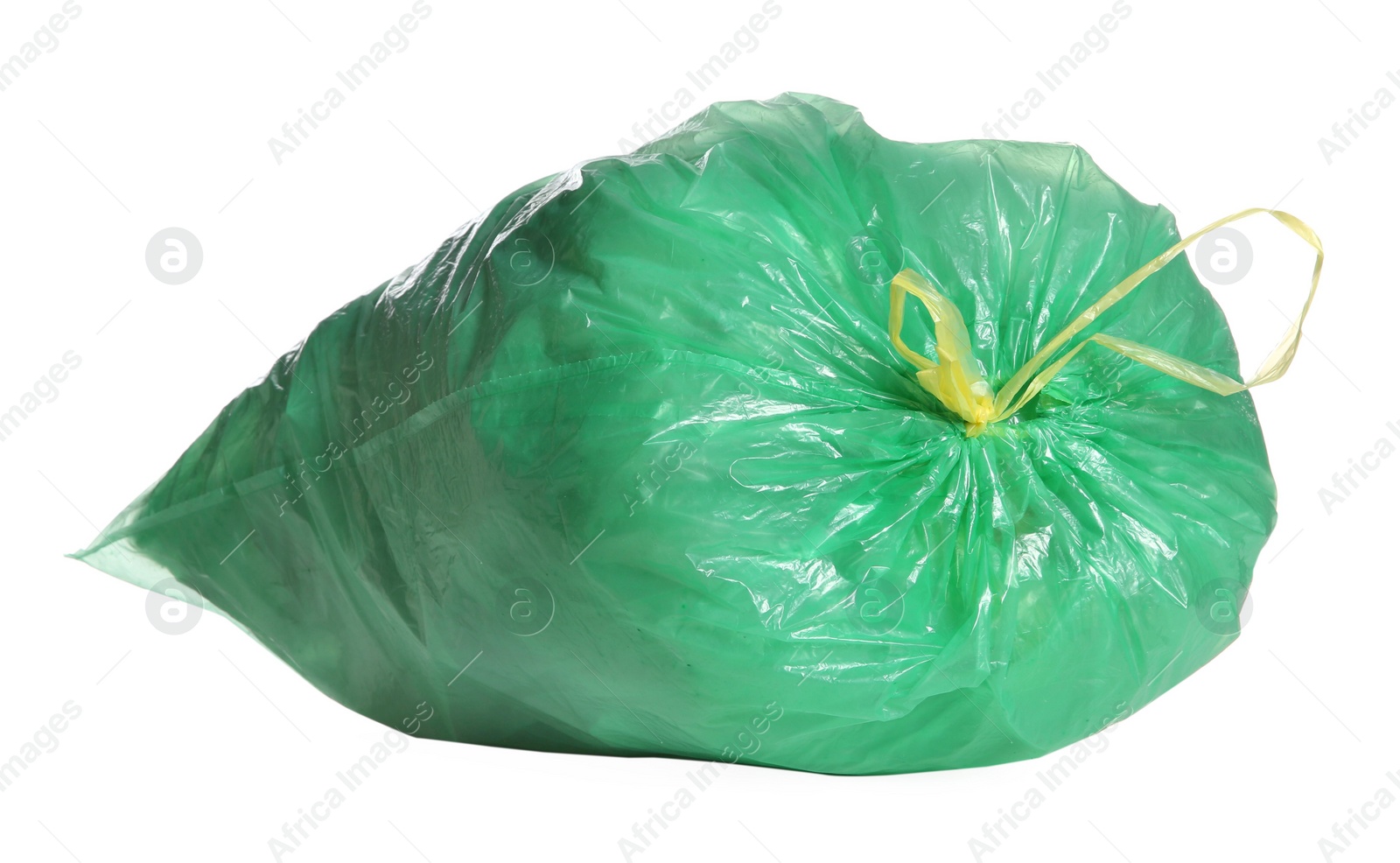 Photo of Green trash bag full of garbage isolated on white