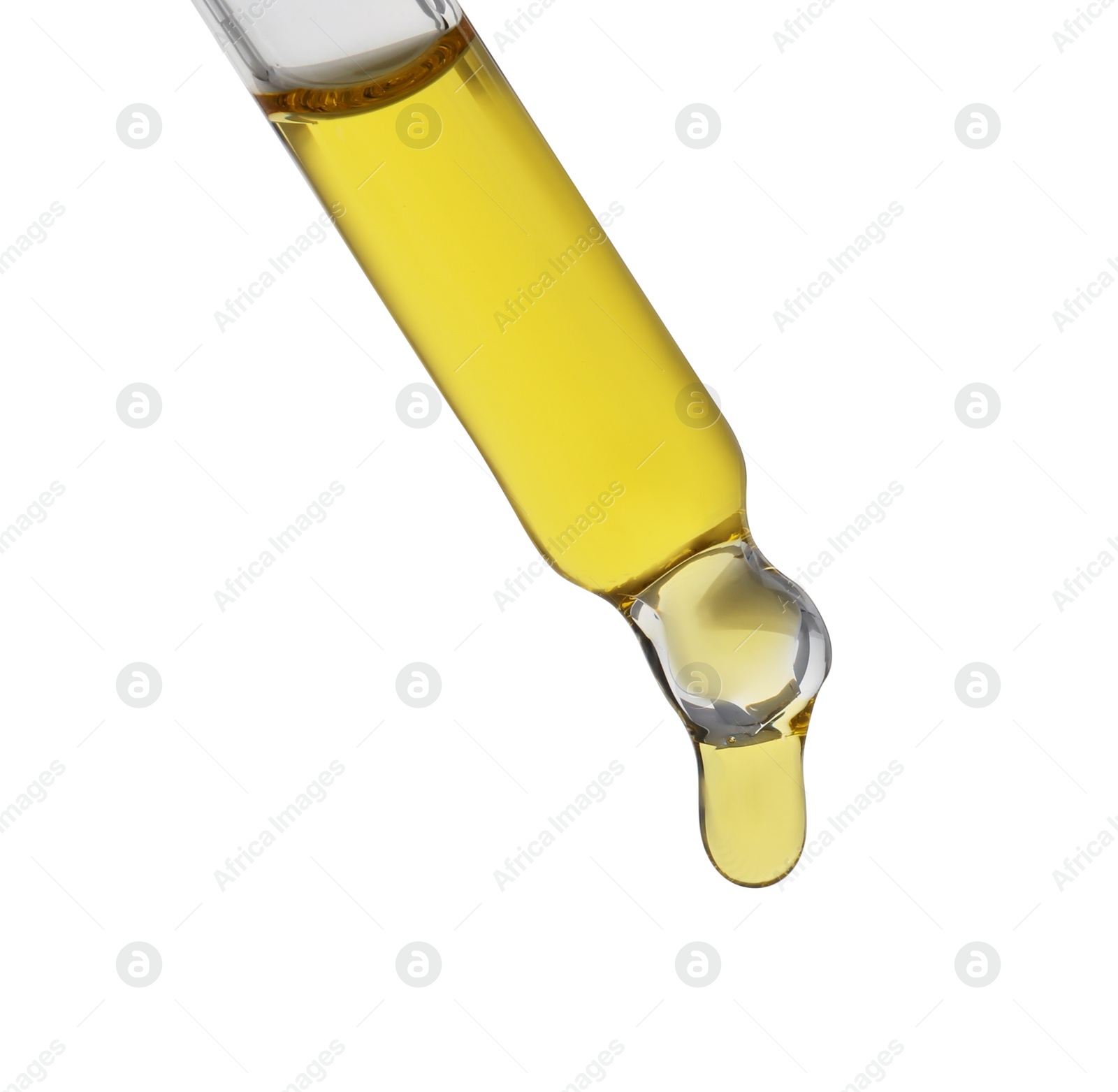 Photo of Dripping tincture from pipette isolated on white