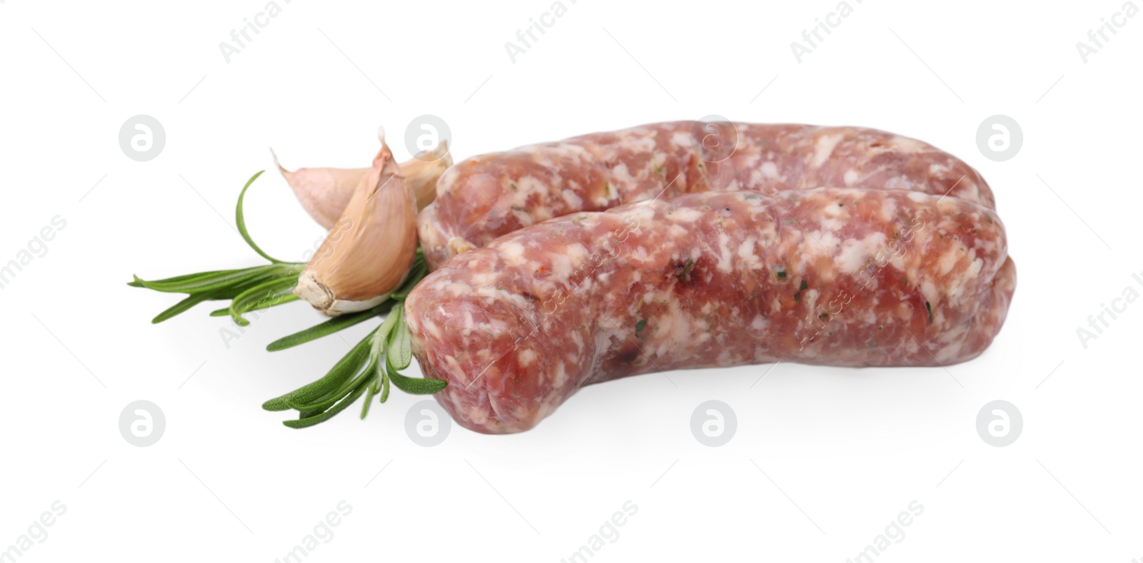 Photo of Raw homemade sausages, rosemary and garlic isolated on white
