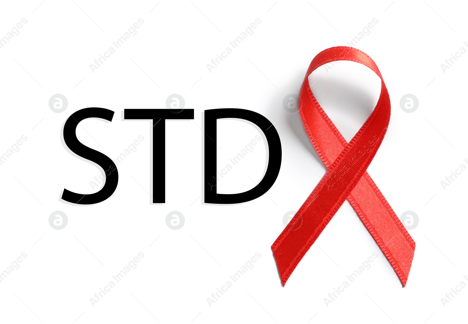 Image of Red awareness ribbon and abbreviation STD on white background, top view 