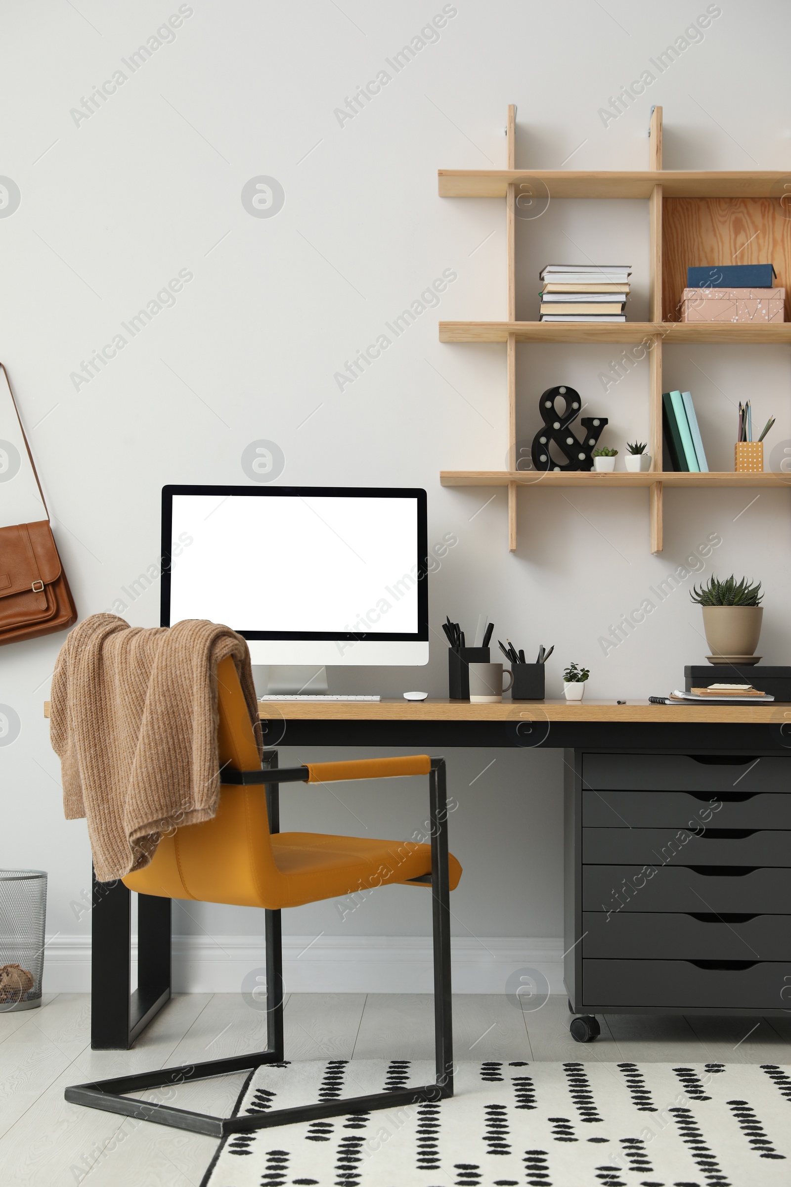 Photo of Stylish room interior with modern comfortable workplace