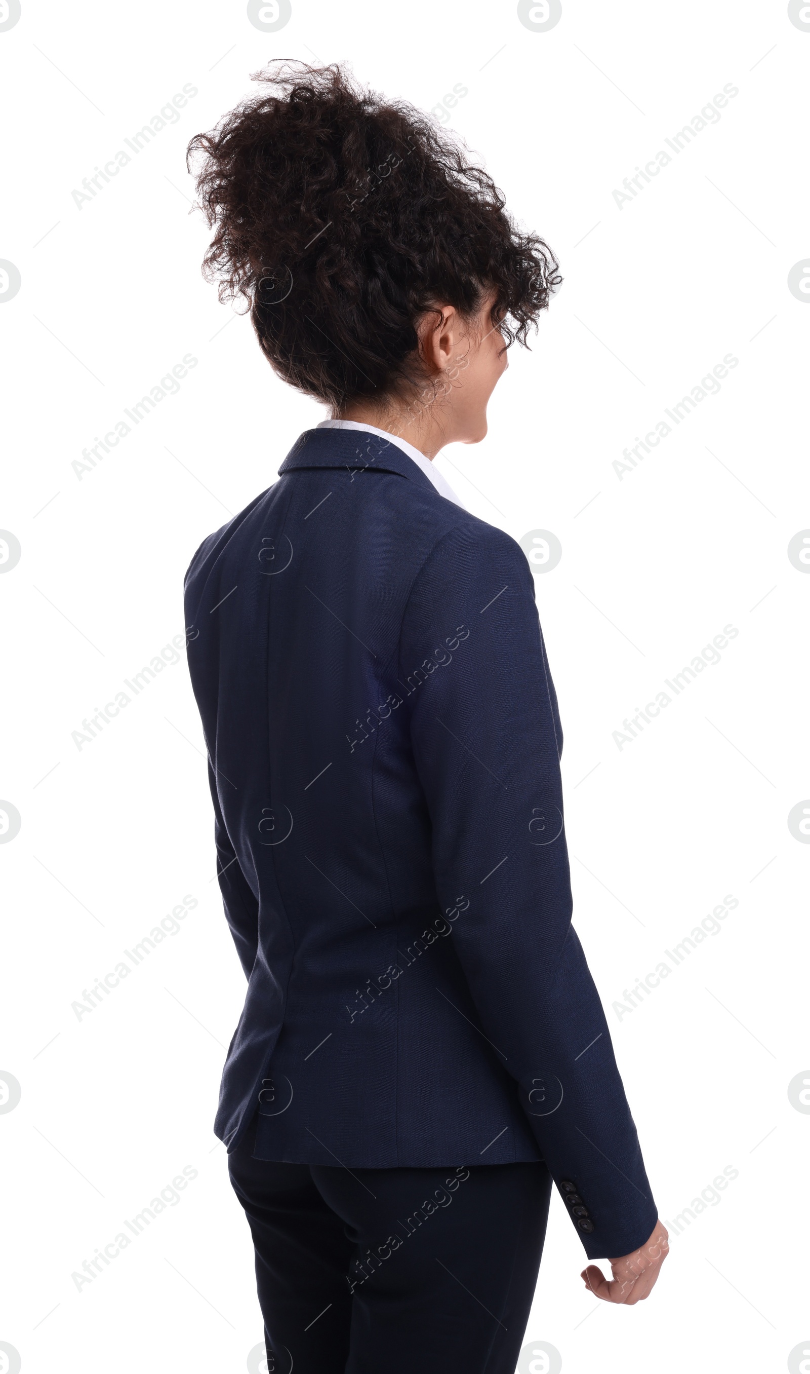 Photo of Young businesswoman in suit standing on white background