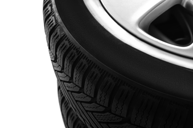 Photo of Set of wheels with winter tires on white background, closeup