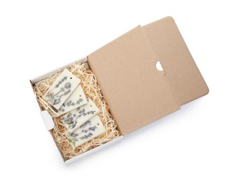 Beautiful scented sachets in box on white background, top view