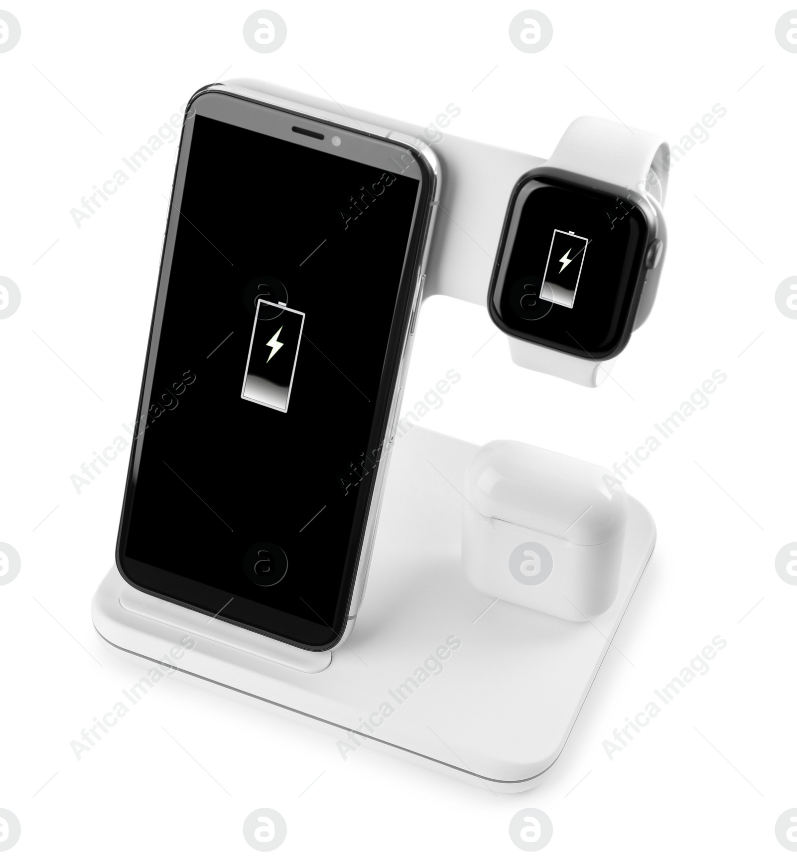 Photo of Set of gadgets charging with wireless pad isolated on white