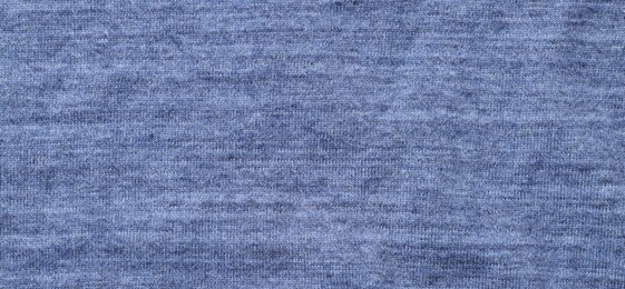 Photo of Texture of soft blue fabric as background, top view