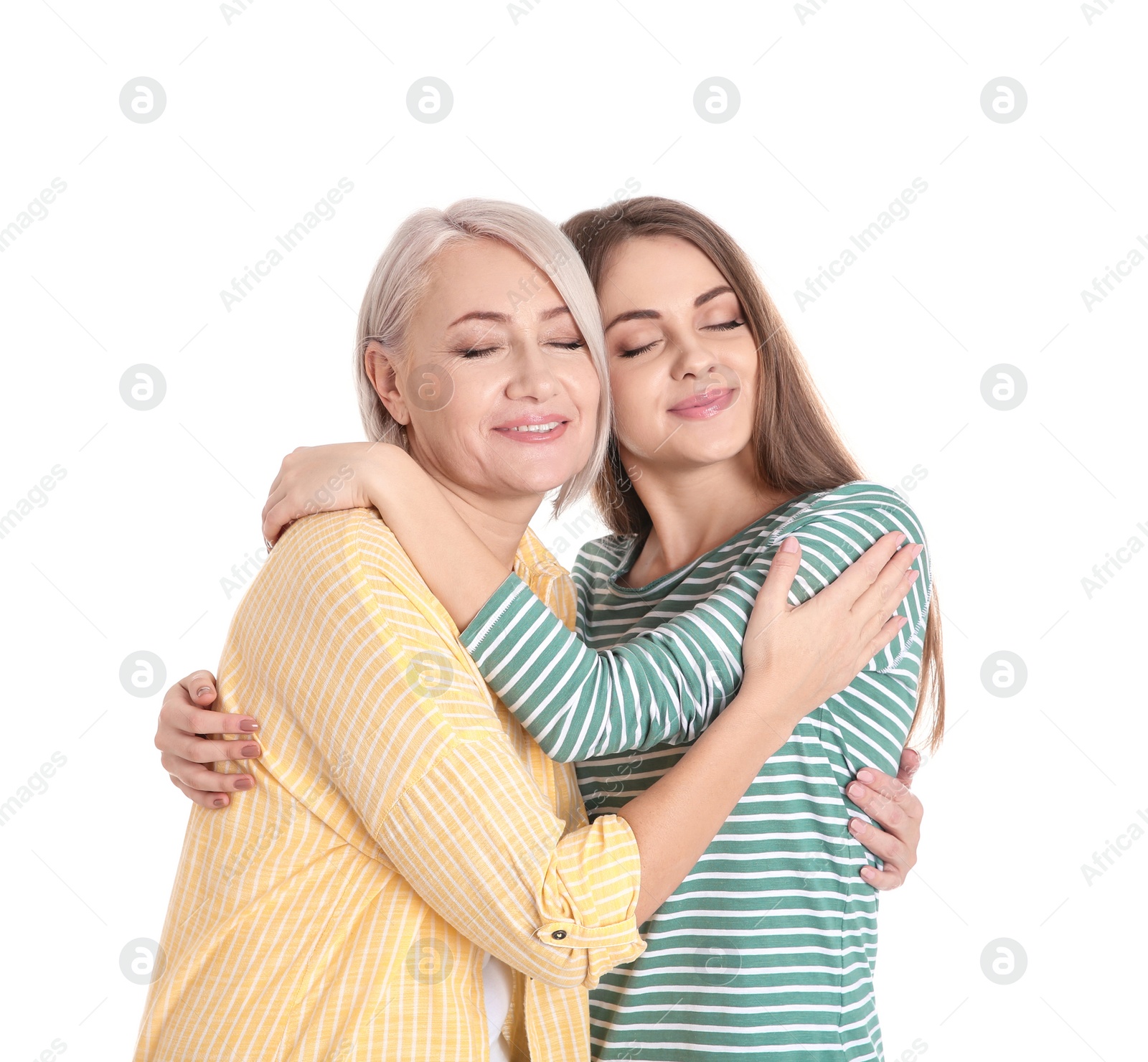 Photo of Portrait of young woman with her mature mother on white background