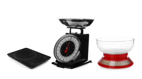 Image of Set with different kitchen scales on white background 