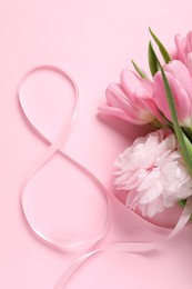 Photo of 8th of March greeting card design with ribbon and beautiful flowers on pink background, flat lay. International Women's day