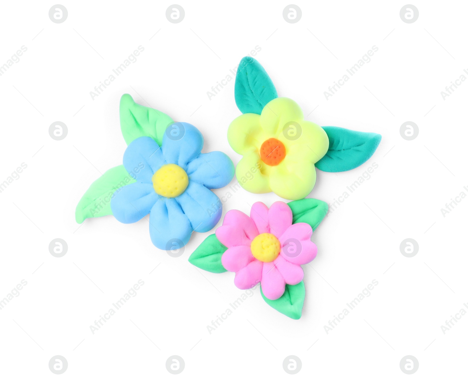 Photo of Colorful flowers with leaves made from play dough on white background, top view