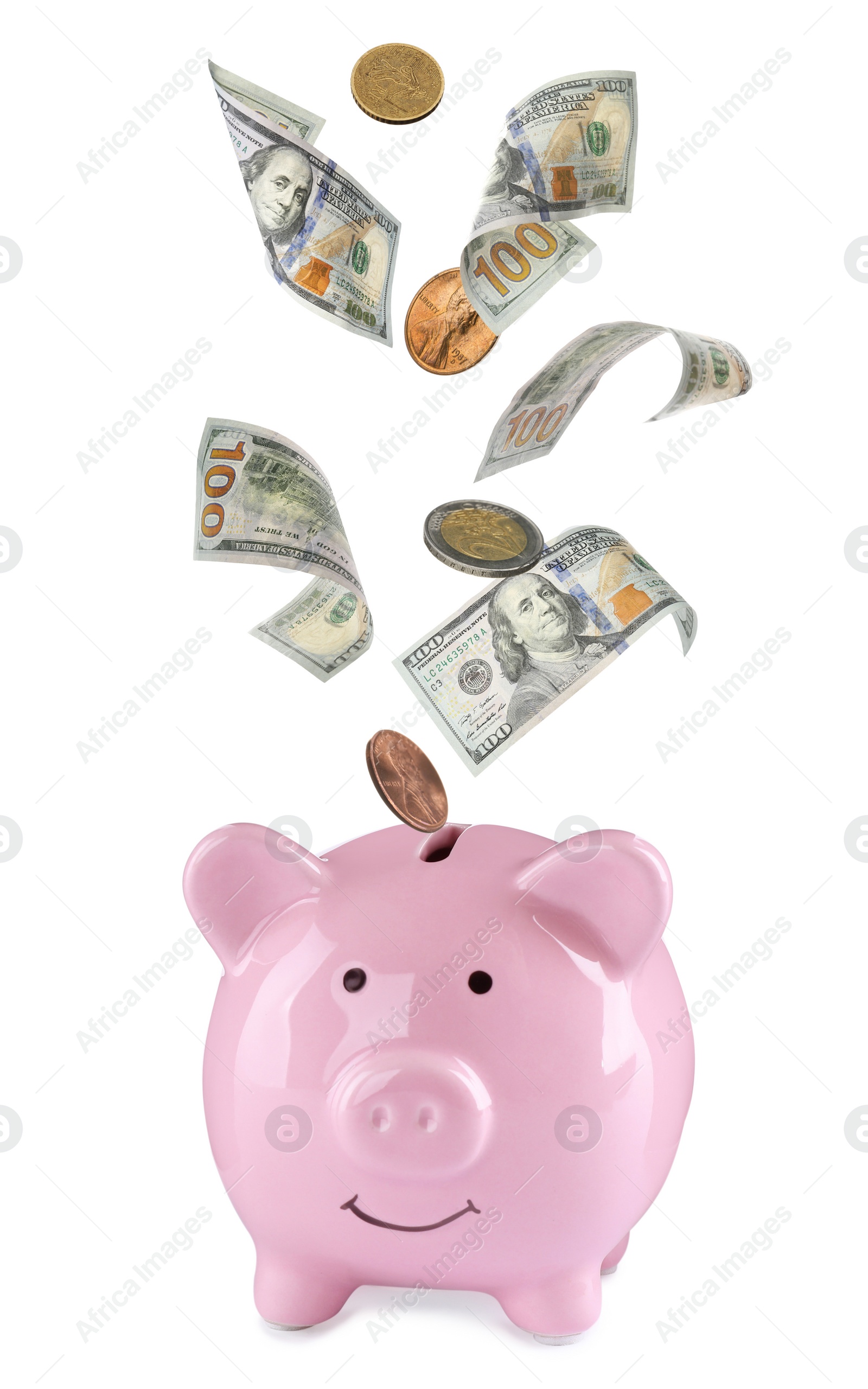 Image of Banknotes and coins falling into piggy bank on white background. Saving money