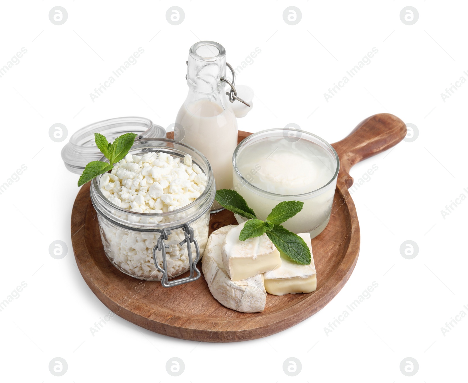 Photo of Different dairy products and mint isolated on white