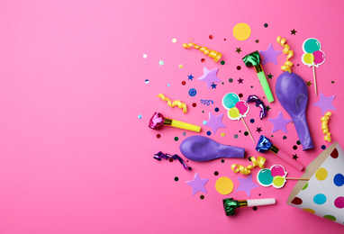 Photo of Flat lay composition with party cap on pink background. Space for text