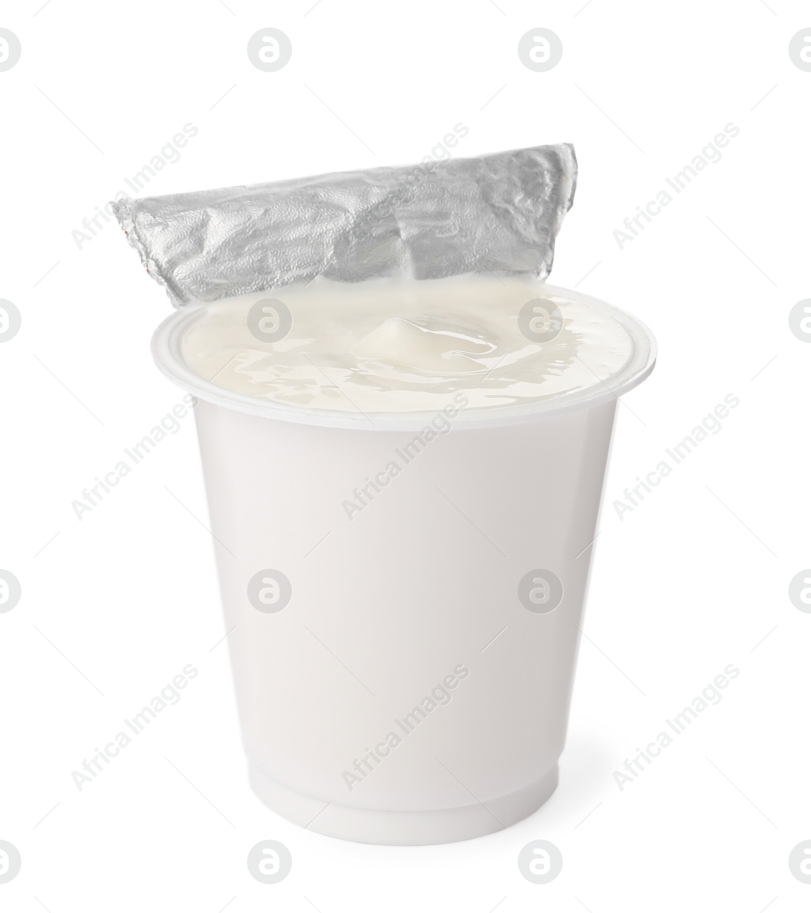 Photo of Delicious organic yogurt in plastic cup isolated on white