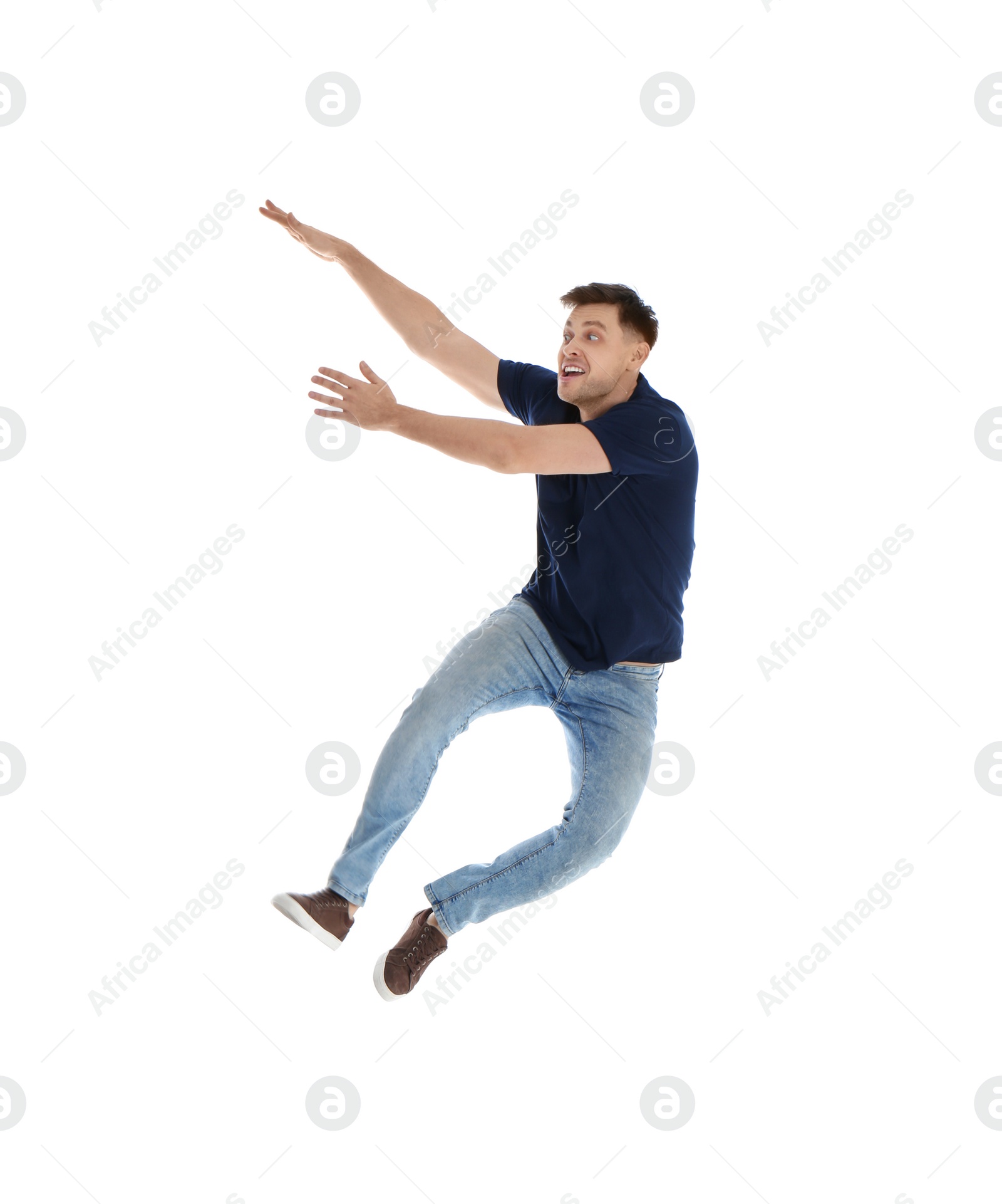 Photo of Emotional man in casual clothes posing on white background